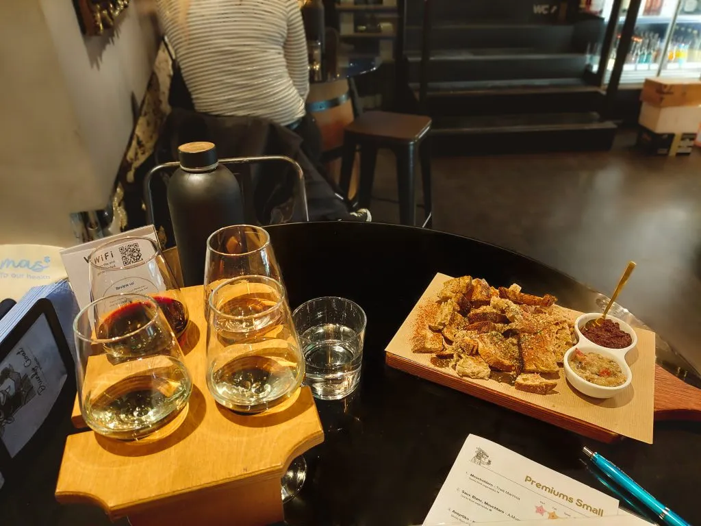 Wine tasting flight and vegan platter at Drunky Goat in Athens Greece