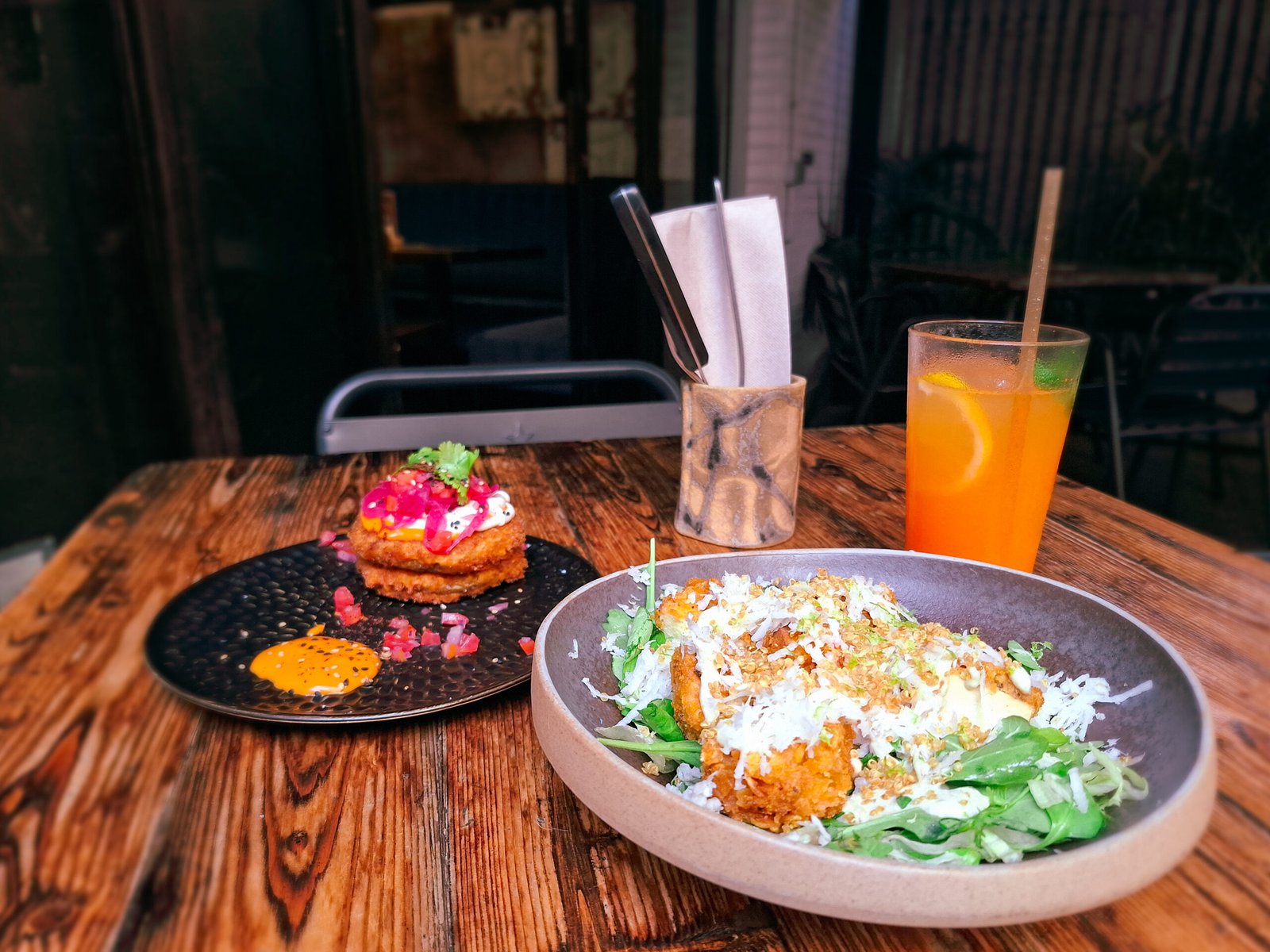 Vrutal Vegan Burger Restaurant in Barcelona - Tofu Caesar Salad and Fried Green Tomatoes with a Carrot Ginger Beer